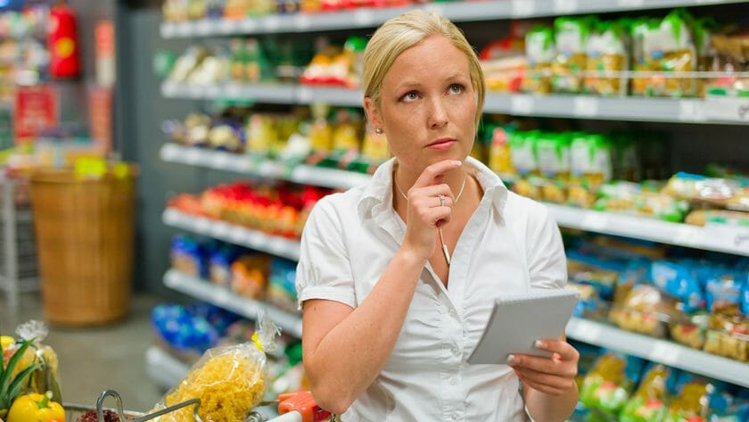 woman contemplating prices dp11657837